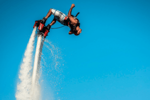 Man flyboarding doing backflip in Miami
